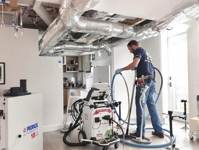 Winchester Air Duct Cleaning technician performing advanced pure duct cleaning with specialized equipment in Winchester